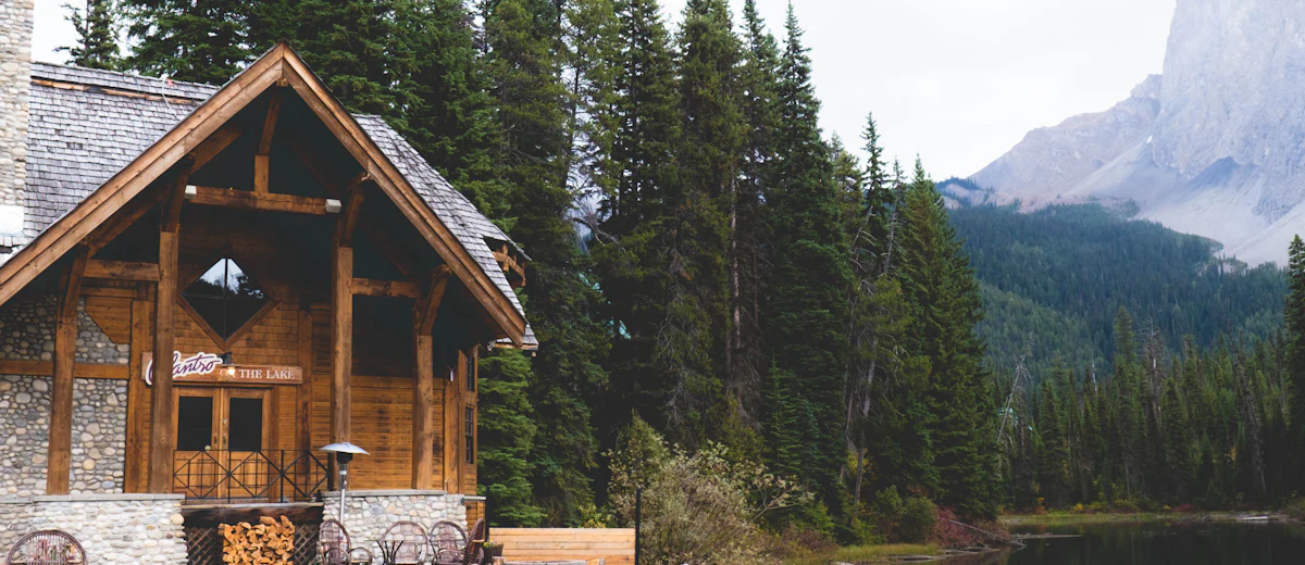 Representative photo: a wooded lakeside home